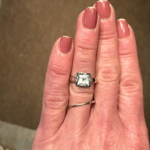 Genuine blue topaz ring, set in 10k white gold.